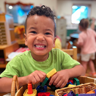 A young child smiling