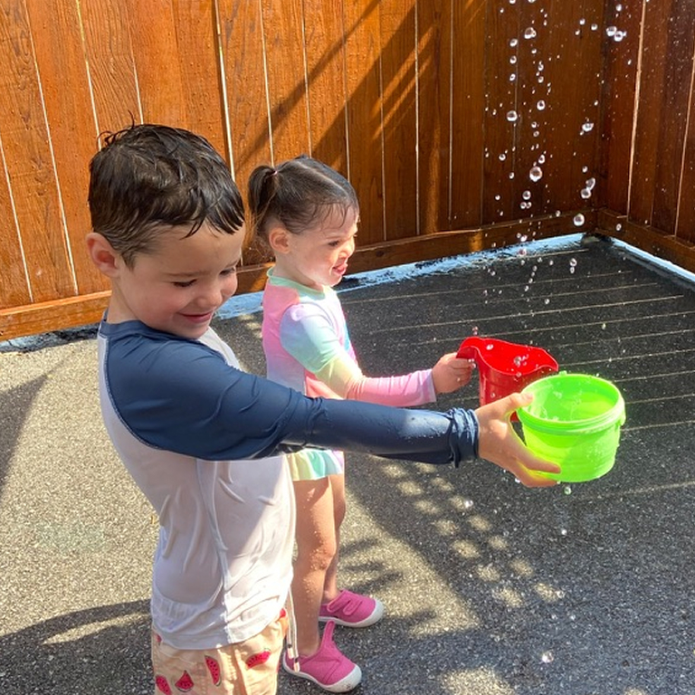 93554def 58fb 4219 aee6 32517d74bb92 1 105 c 1 Children catching dripping water with small buckets